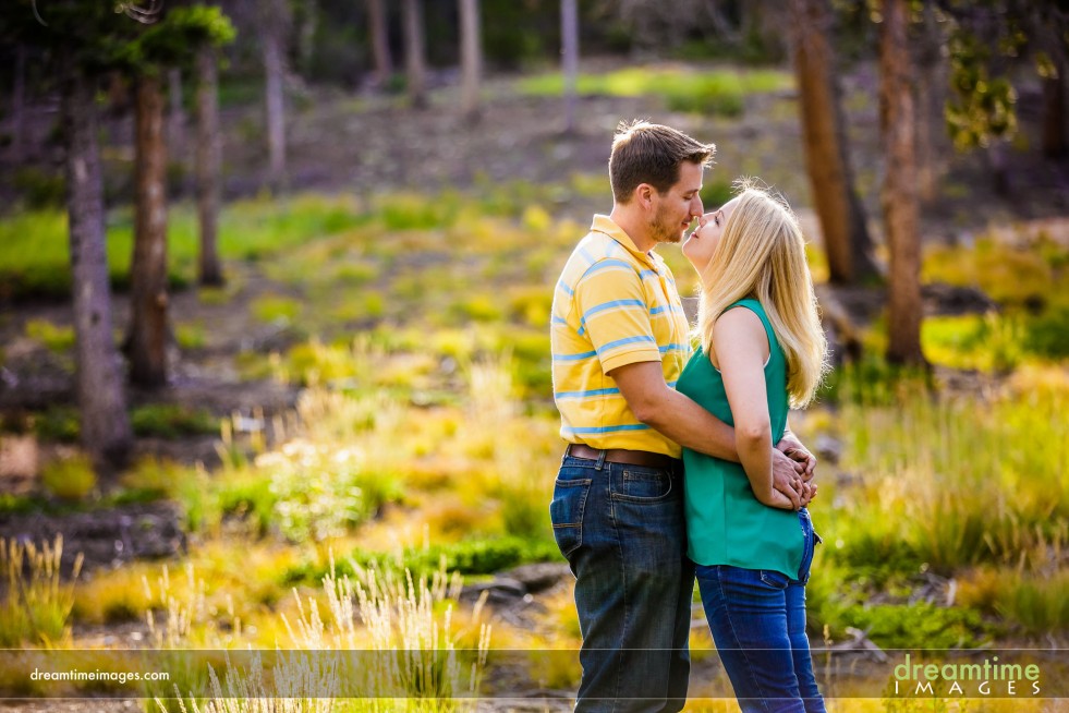 Couple kissing in the late afternoon in Estes Park