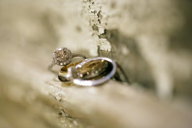 Wedding rings of diamonds, gems, metals and wood | Dreamtime Images